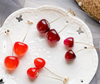 aretes cereza